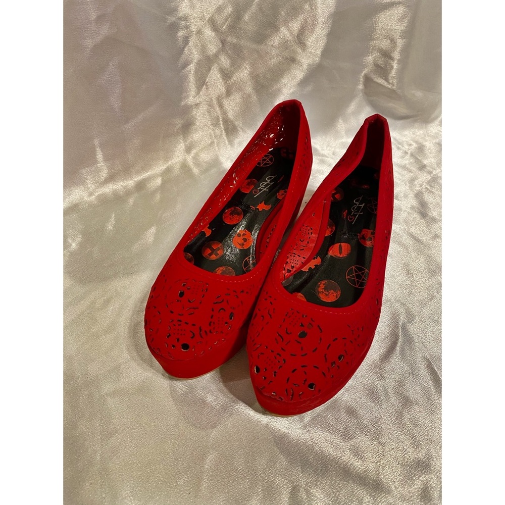 Red velvet skull shoes.